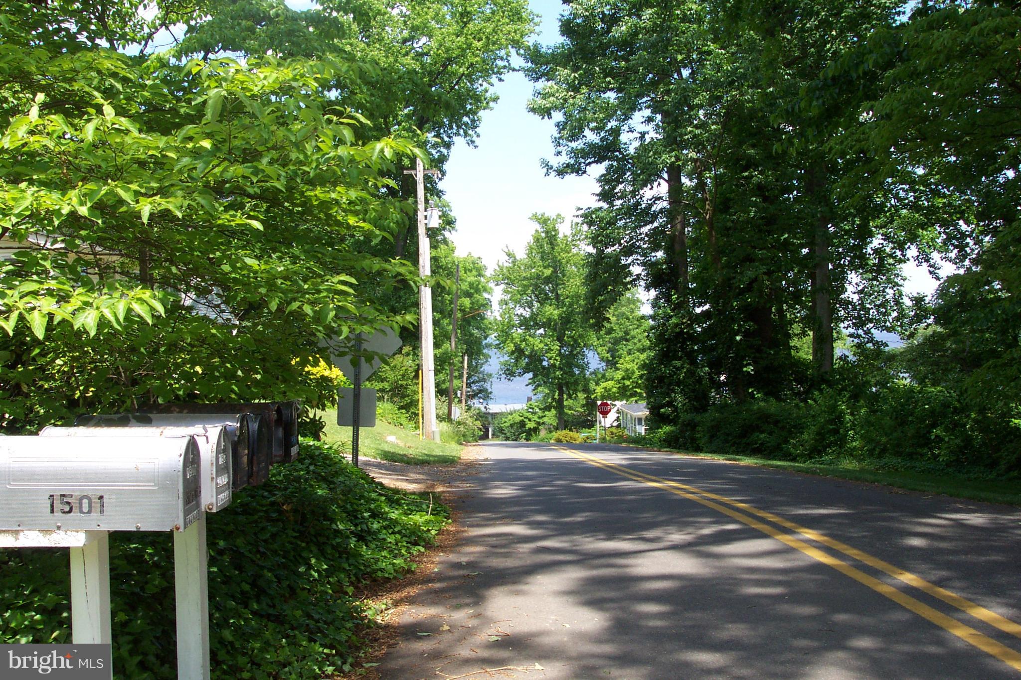 1501 Dogwood Road St. Leonard, MD 20685 - Photo 5 of 27 A peak at the Chesapeake Bay - walk to beach!