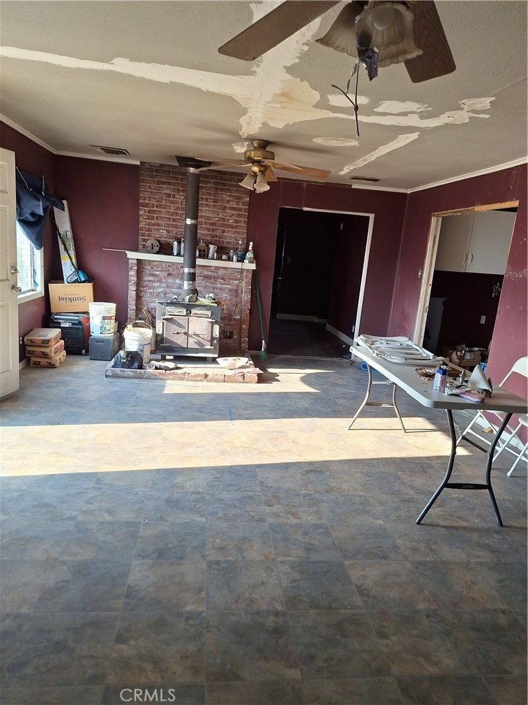 2352 Jacks Ranch Road Ridgecrest, CA 93555 - Photo 14 of 33 a view of a room with gym equipment