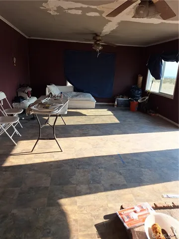 a bed room with a bed and a dresser