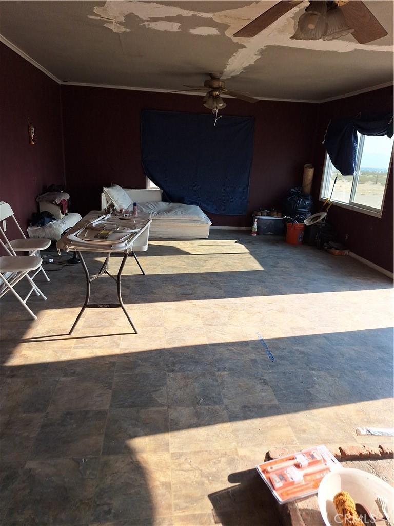 2352 Jacks Ranch Road Ridgecrest, CA 93555 - Photo 17 of 33 a bed room with a bed and a dresser