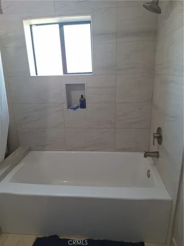 a bathroom with a bathtub