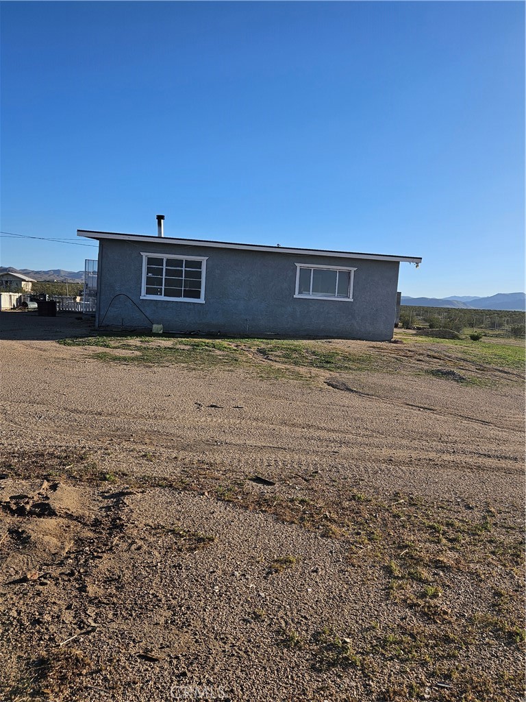2352 Jacks Ranch Road Ridgecrest, CA 93555 - Photo 9 of 33 a view of a yard