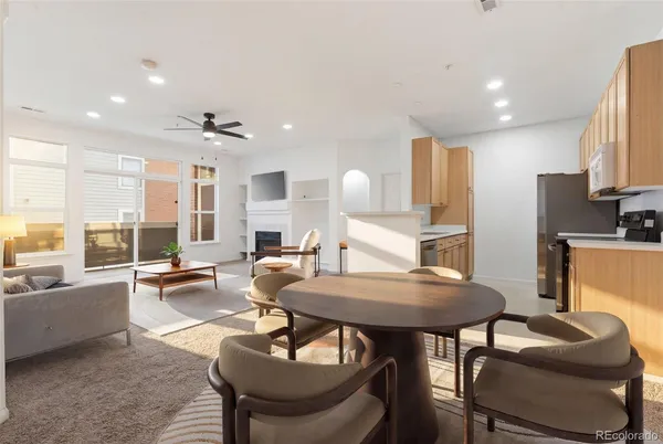 a view of kitchen with dining table and chairs