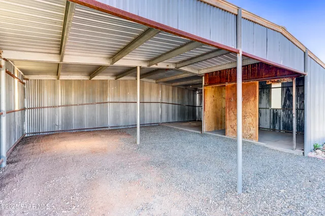 a view of a room with wooden walls