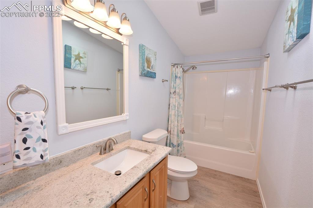 123 Pawutsy Road Florissant, CO 80816 - Photo 16 of 30 a bathroom with a sink a toilet and shower