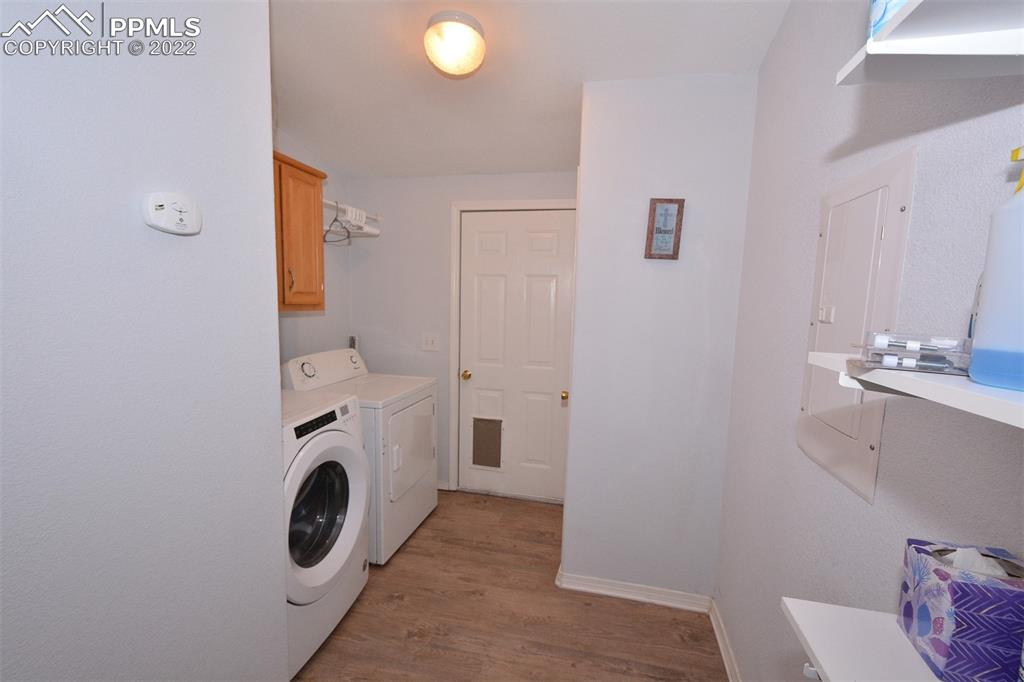 123 Pawutsy Road Florissant, CO 80816 - Photo 23 of 30 a utility room with dryer and washer