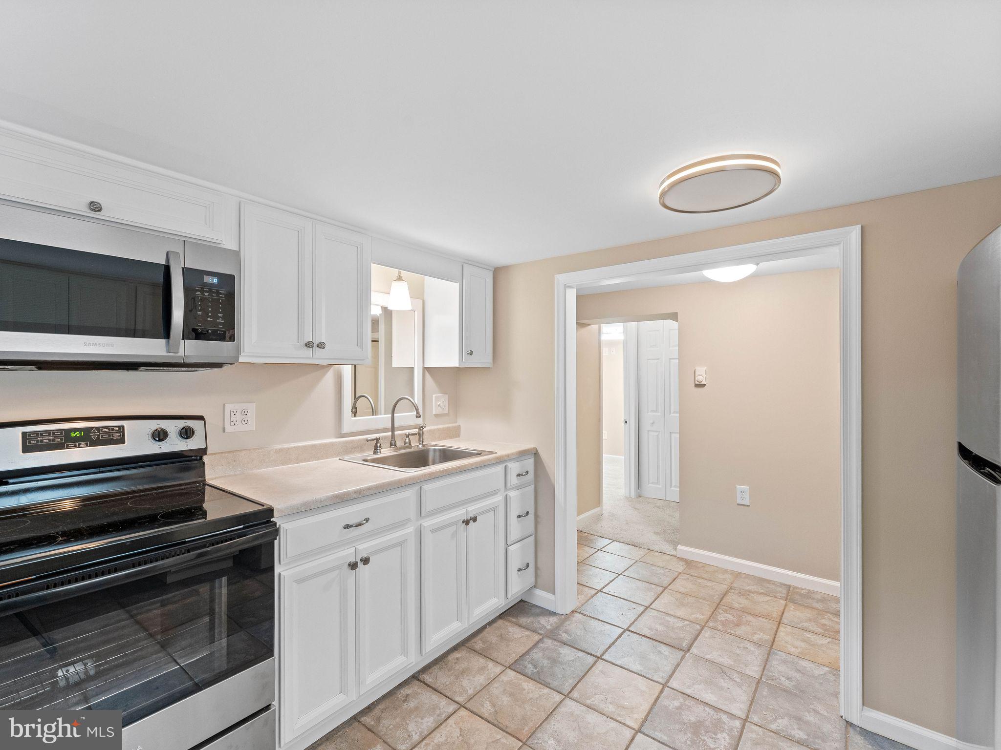 3395 Upper Valley Road Parkesburg, PA 19365 - Photo 29 of 56 Updated kitchen in Lower Level with breakfast bar
