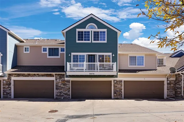 a view of a house with a garage