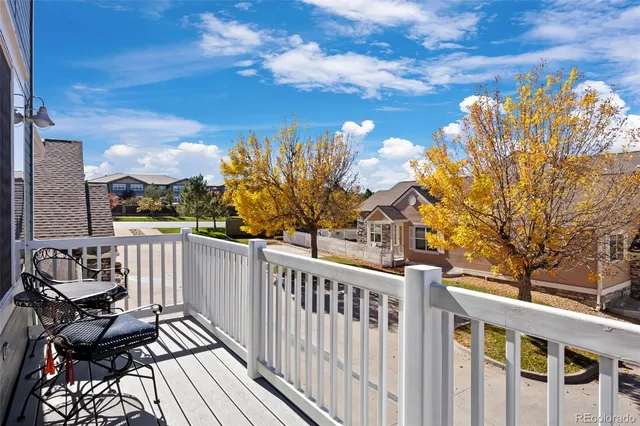 a view of a chairs on the roof deck
