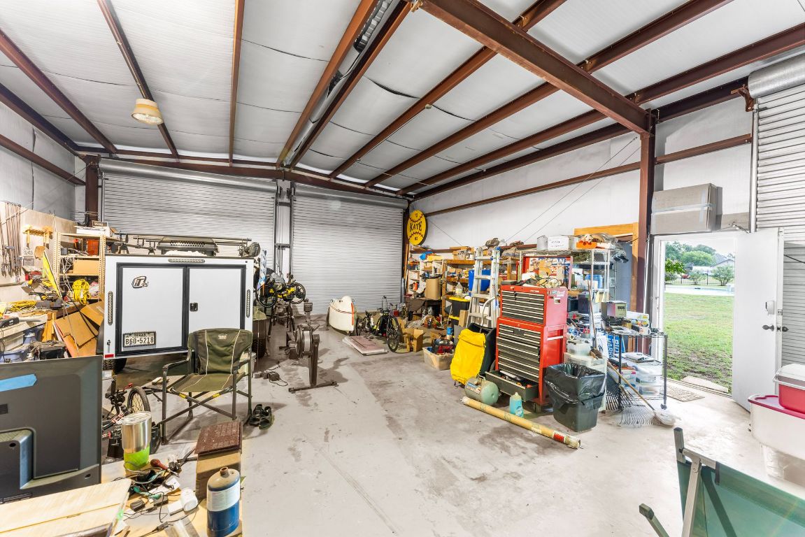 221 Breakaway Road Cedar Park, TX 78613 - Photo 19 of 39 a view of a room with gym equipment