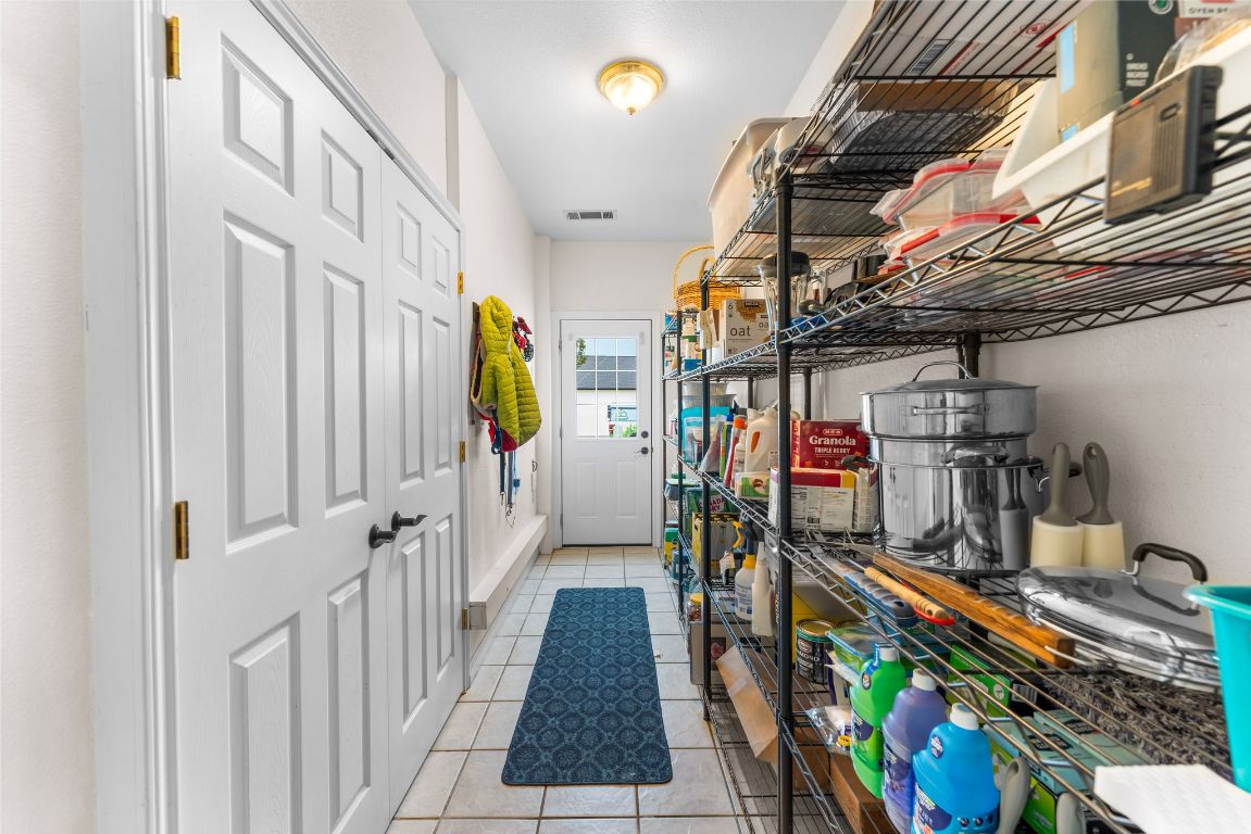 221 Breakaway Road Cedar Park, TX 78613 - Photo 27 of 39 a view of storage and utility room