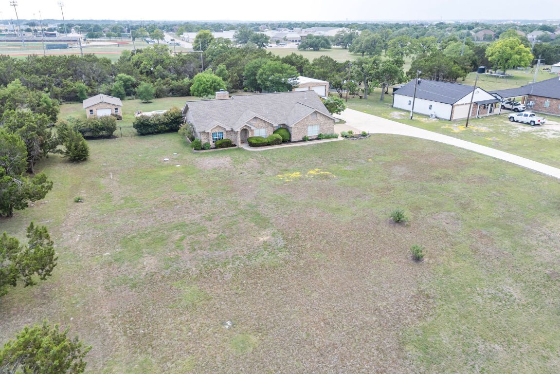 221 Breakaway Road Cedar Park, TX 78613 - Photo 6 of 39 a view of a houses with yard and mountain view