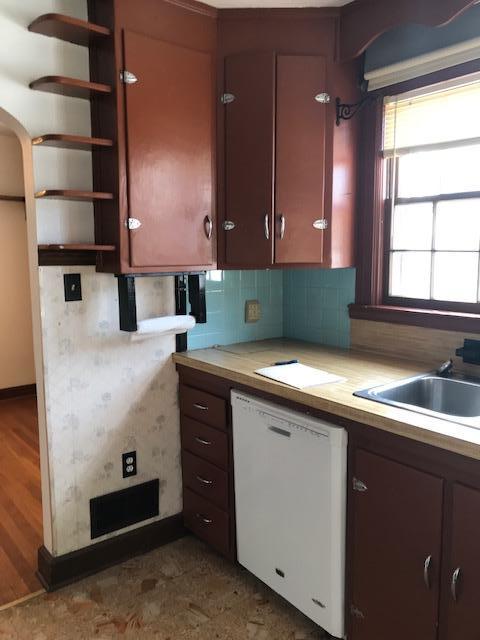 313 Turner Road Salem, VA 24153 - Photo 2 of 15 a kitchen with a sink and cabinets