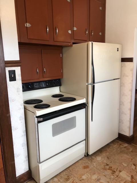 313 Turner Road Salem, VA 24153 - Photo 11 of 15 a kitchen with a refrigerator sink and cabinets
