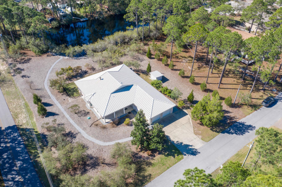 377 Ridge Road Santa Rosa Beach, FL 32459 - Photo 1 of 46 an aerial view of residential house with outdoor space