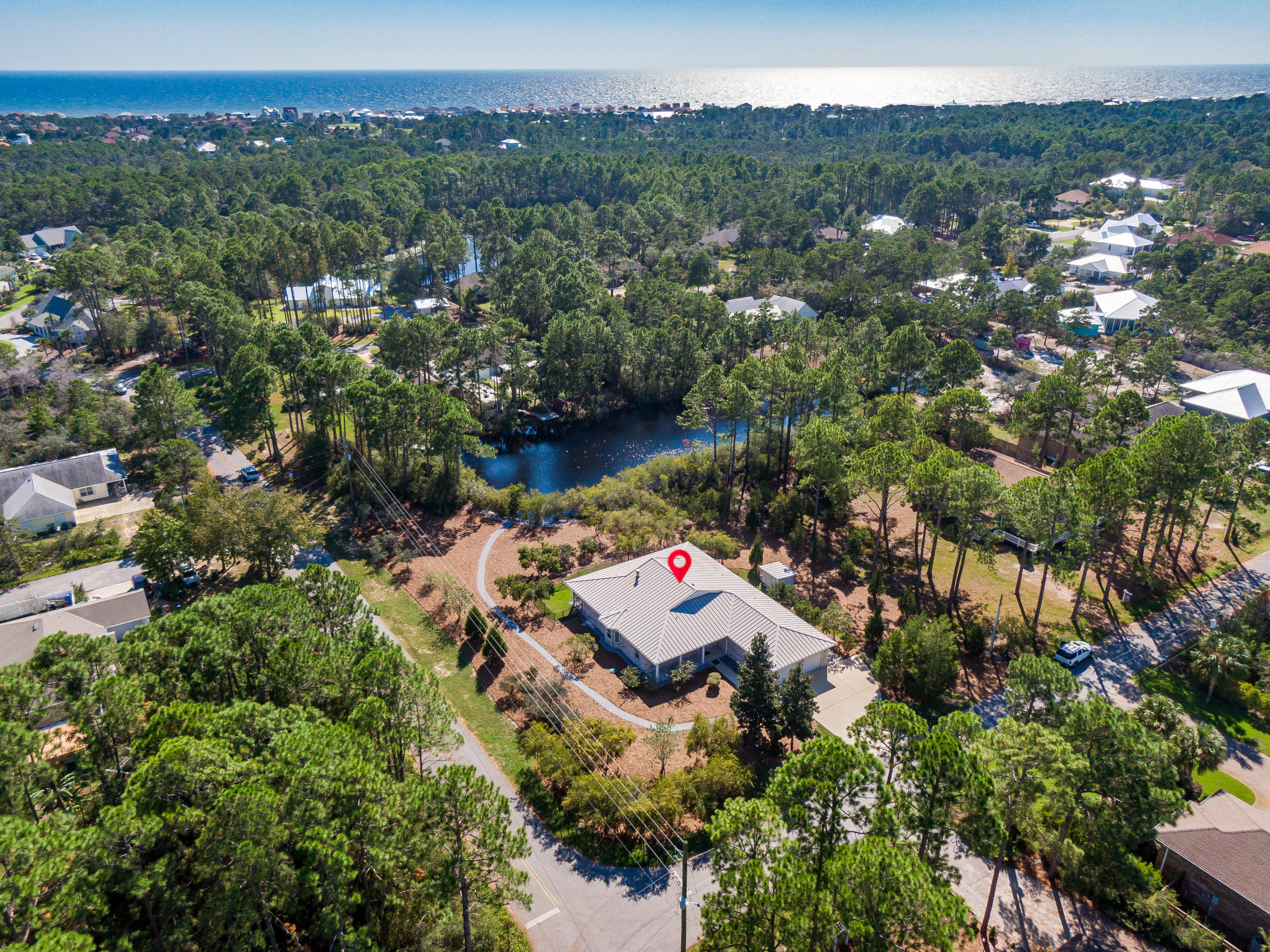 377 Ridge Road Santa Rosa Beach, FL 32459 - Photo 18 of 46 an aerial view of residential house with outdoor space and trees all around