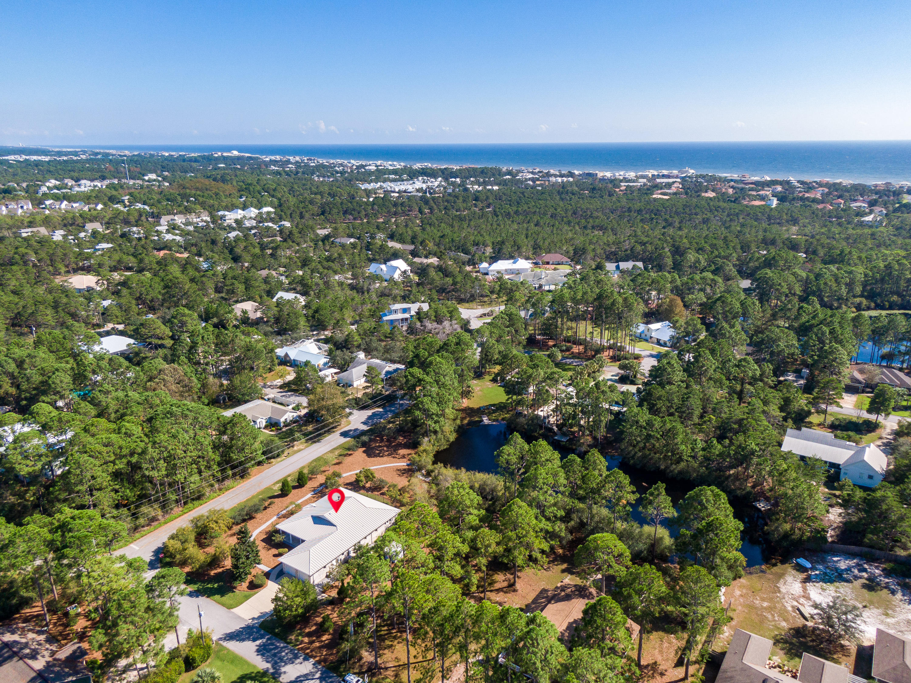 377 Ridge Road Santa Rosa Beach, FL 32459 - Photo 23 of 46 an aerial view of residential houses with outdoor space and trees