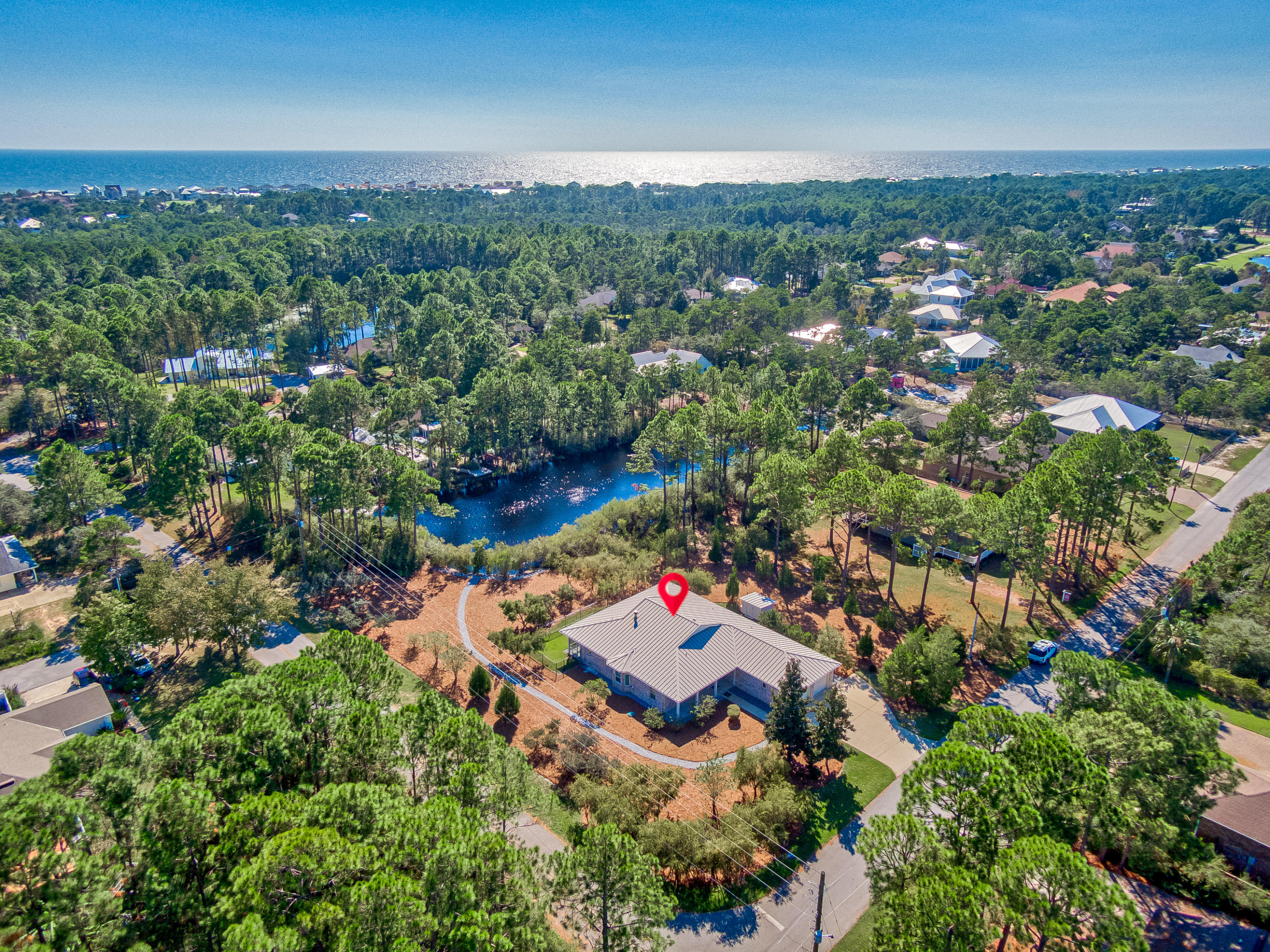 377 Ridge Road Santa Rosa Beach, FL 32459 - Photo 27 of 46 an aerial view of a city with lots of residential buildings