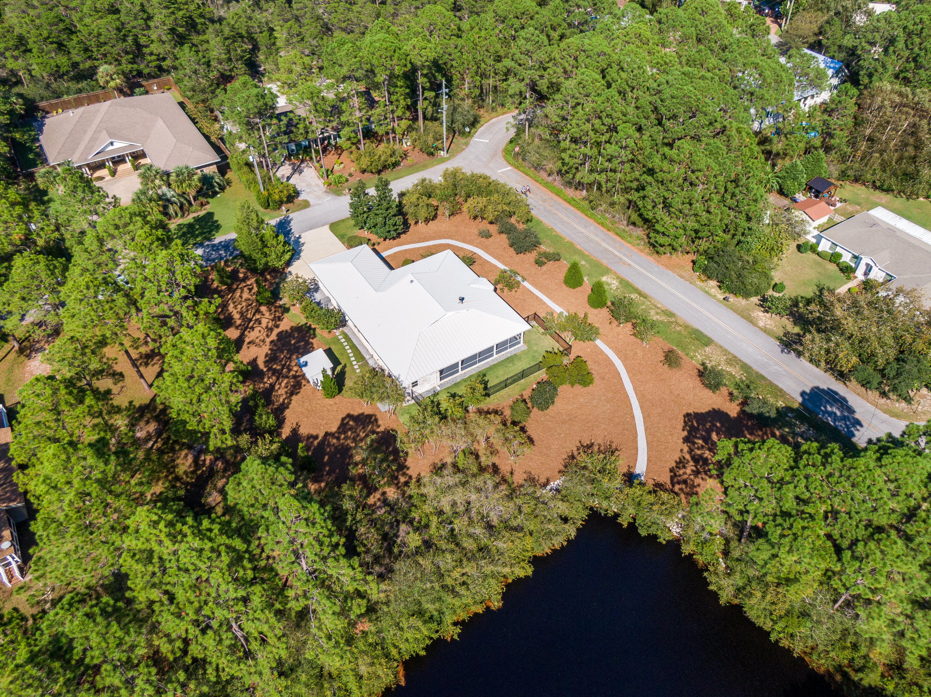 377 Ridge Road Santa Rosa Beach, FL 32459 - Photo 29 of 46 an aerial view of a house with a yard