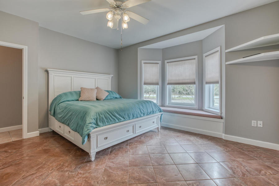 377 Ridge Road Santa Rosa Beach, FL 32459 - Photo 6 of 46 a bedroom with a bed and window