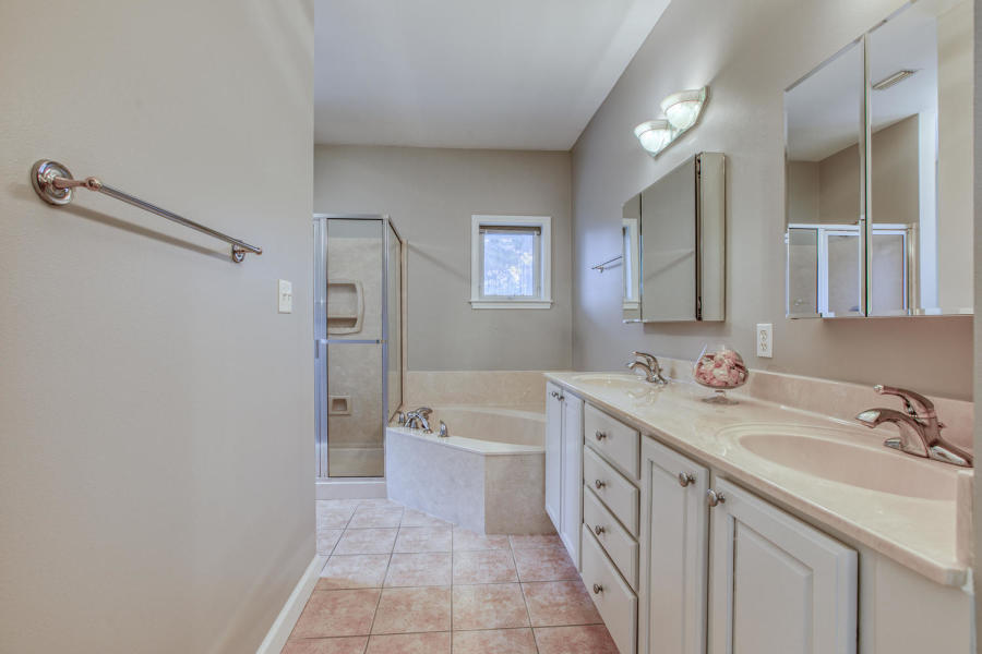 377 Ridge Road Santa Rosa Beach, FL 32459 - Photo 7 of 46 a bathroom with a sink a toilet and shower