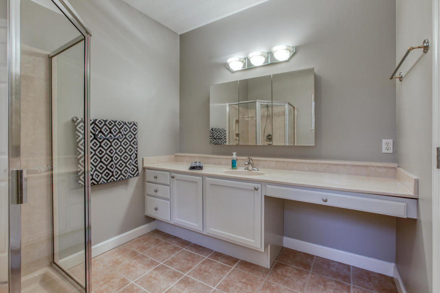 377 Ridge Road Santa Rosa Beach, FL 32459 - Photo 9 of 46 a bathroom with a sink vanity and mirror