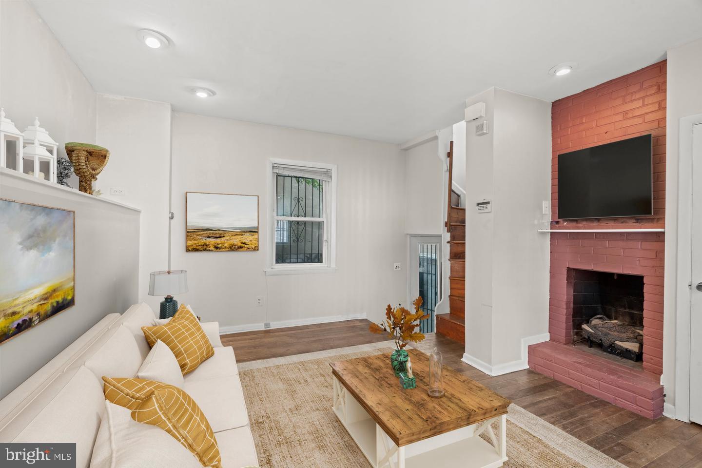 1314 Addison Street Philadelphia, PA 19147 - Photo 1 of 21 a living room with furniture and a flat screen tv