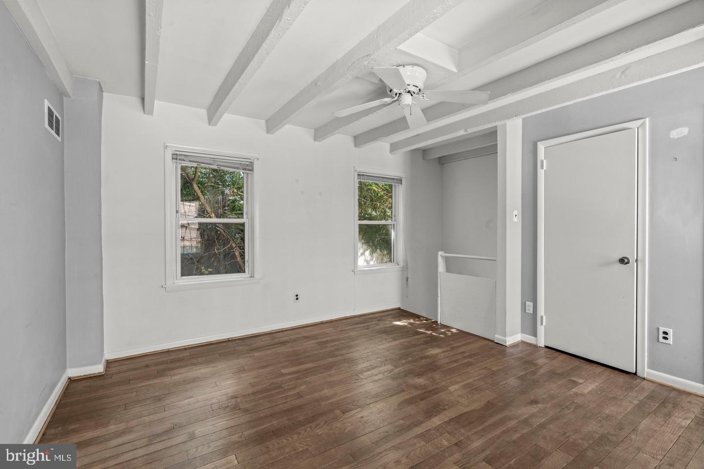 1314 Addison Street Philadelphia, PA 19147 - Photo 14 of 21 wooden floor in an empty room with a window