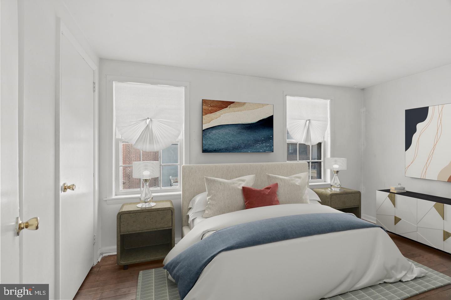 1314 Addison Street Philadelphia, PA 19147 - Photo 8 of 21 a bedroom with a bed and wooden floor