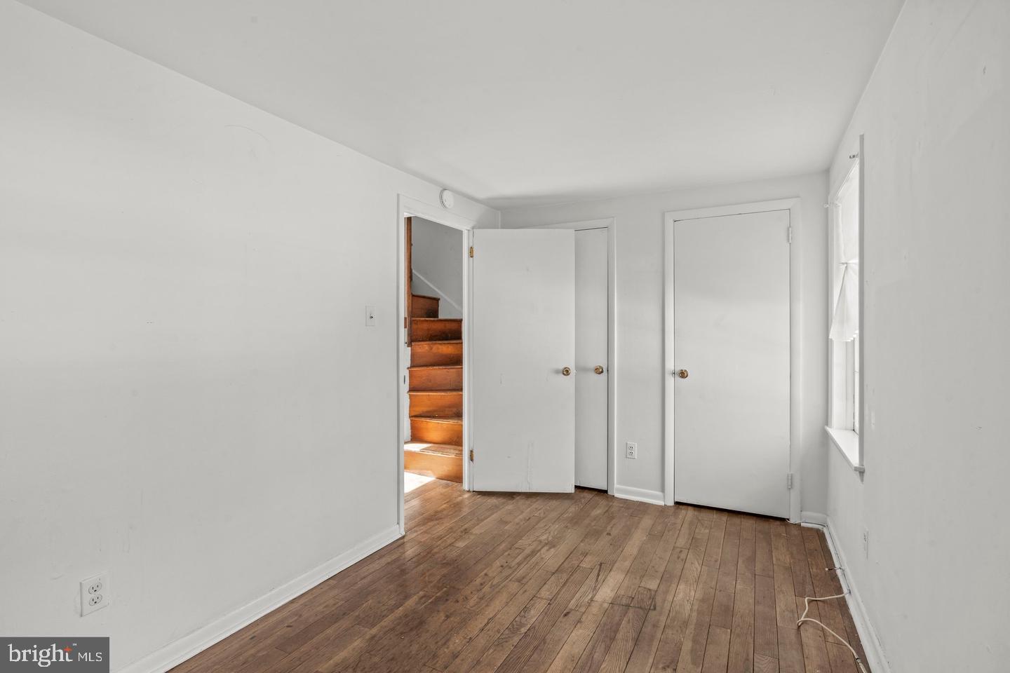 1314 Addison Street Philadelphia, PA 19147 - Photo 10 of 21 a view of an empty room with wooden floor and closet