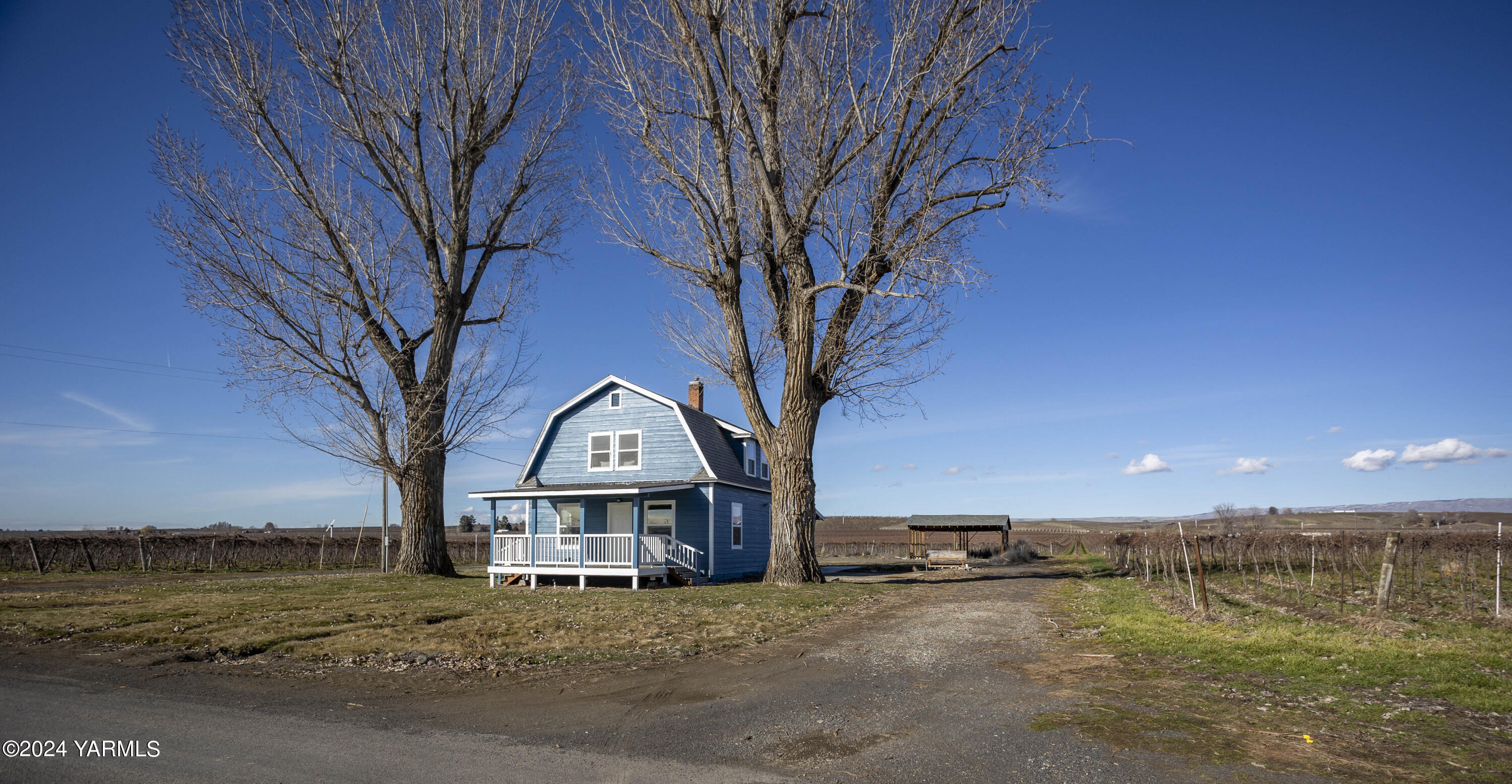 93902 McCreadie Road Prosser, WA 99350 - Photo 1 of 47 a view of a house with a yard