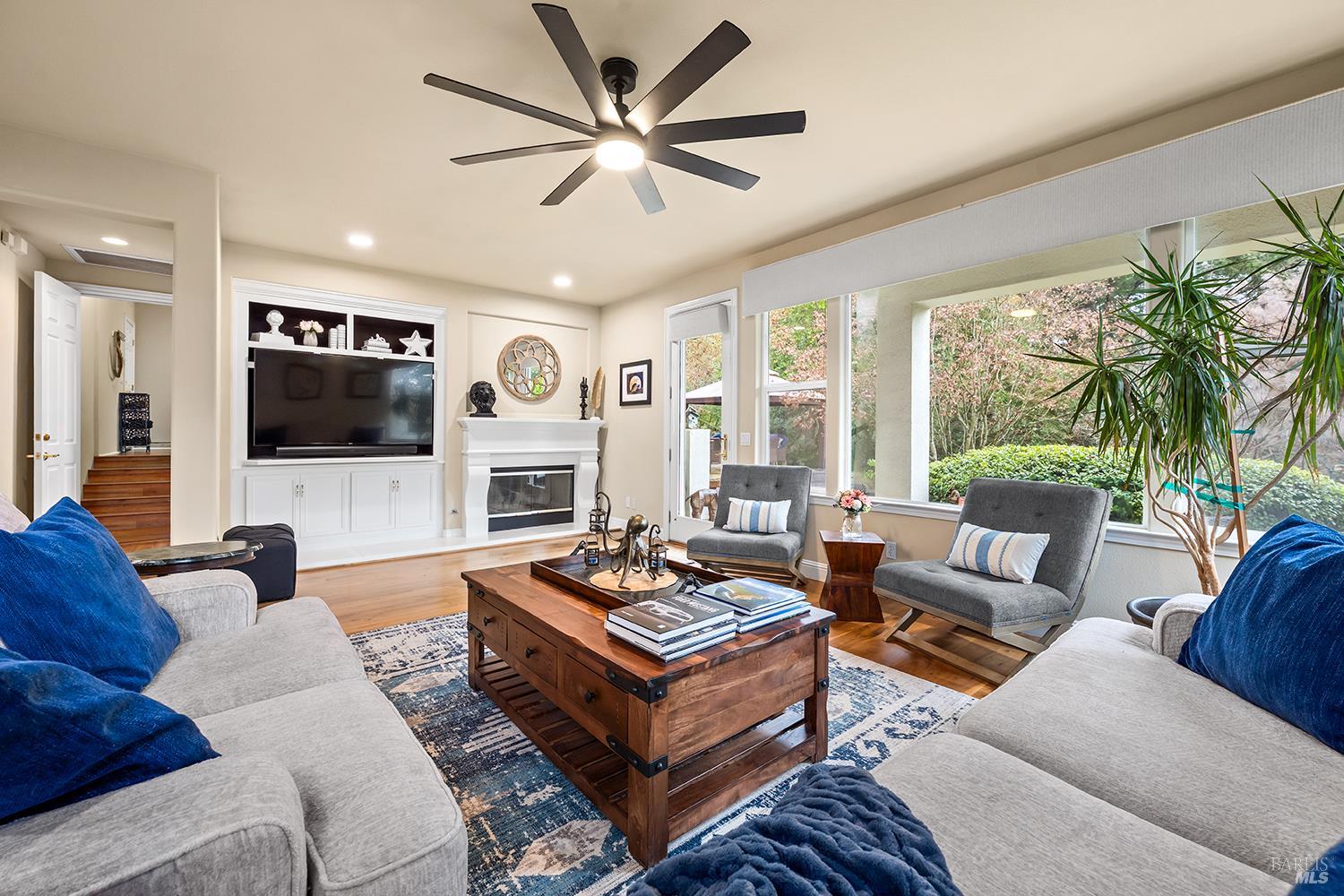3696 Newbury Court Santa Rosa, CA 95404 - Photo 20 of 79 a living room with furniture fireplace and a flat screen tv