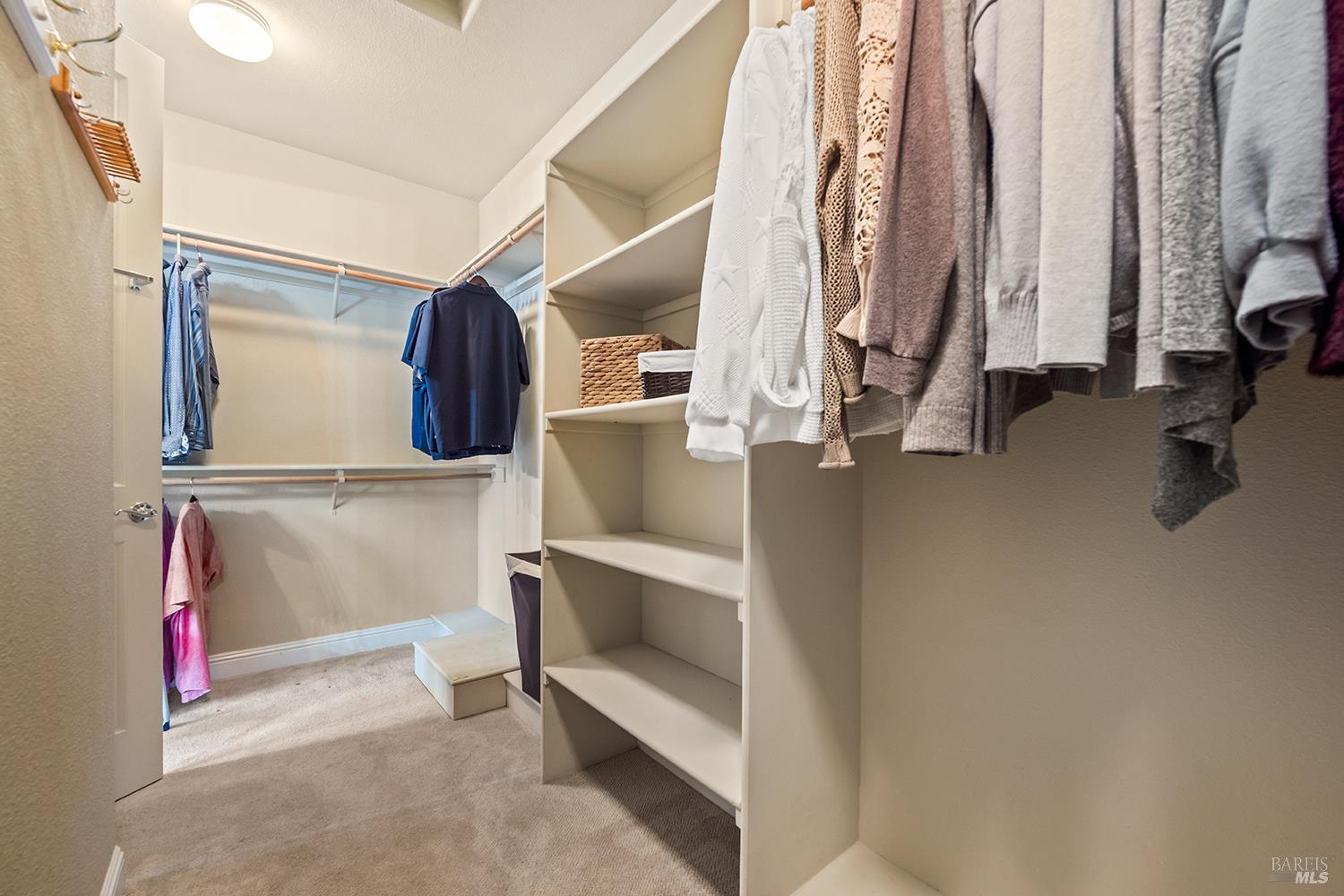 3696 Newbury Court Santa Rosa, CA 95404 - Photo 33 of 59 a view of walk in closet with clothes and shoes
