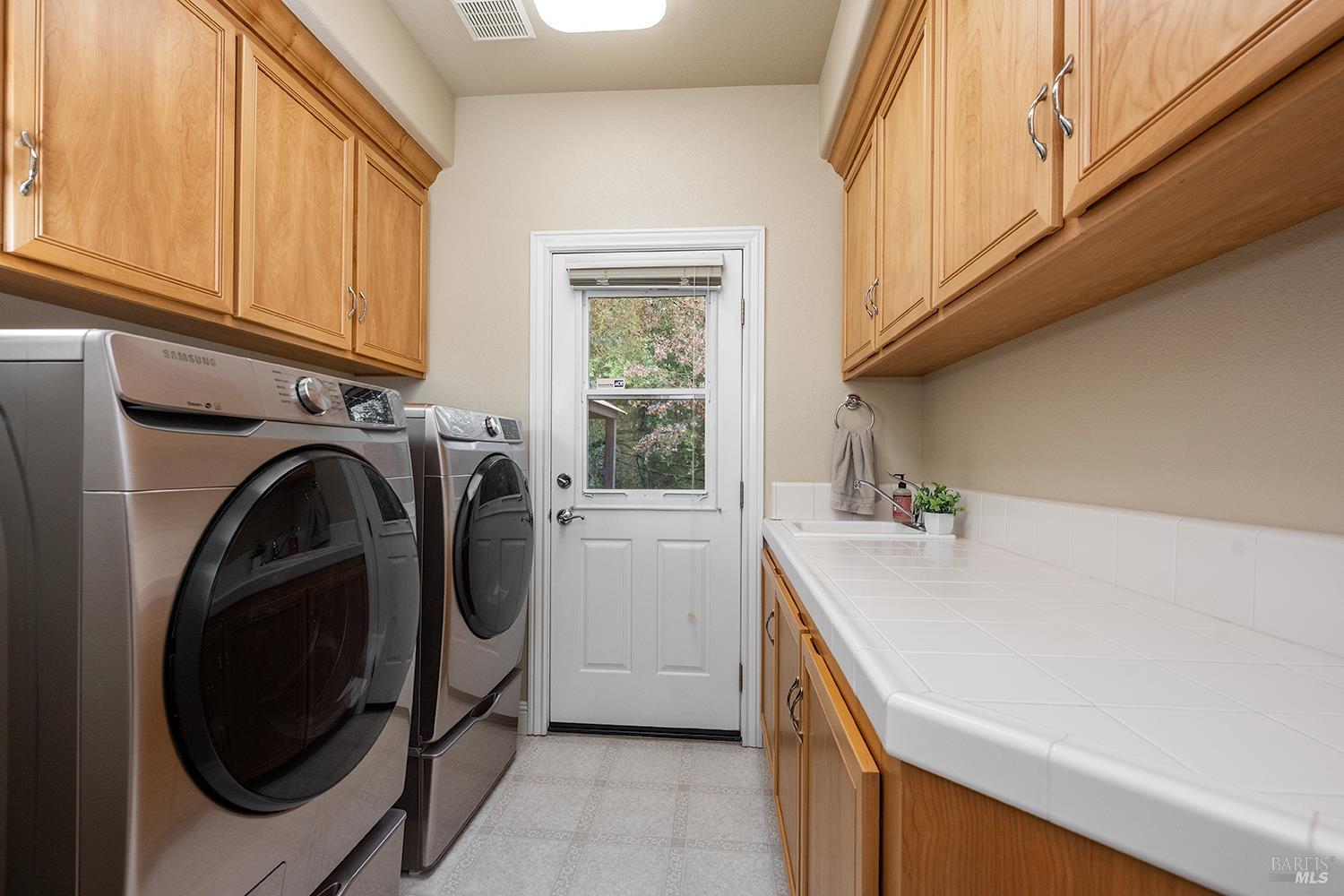 3696 Newbury Court Santa Rosa, CA 95404 - Photo 46 of 59 a view of a kitchen with washer and dryer