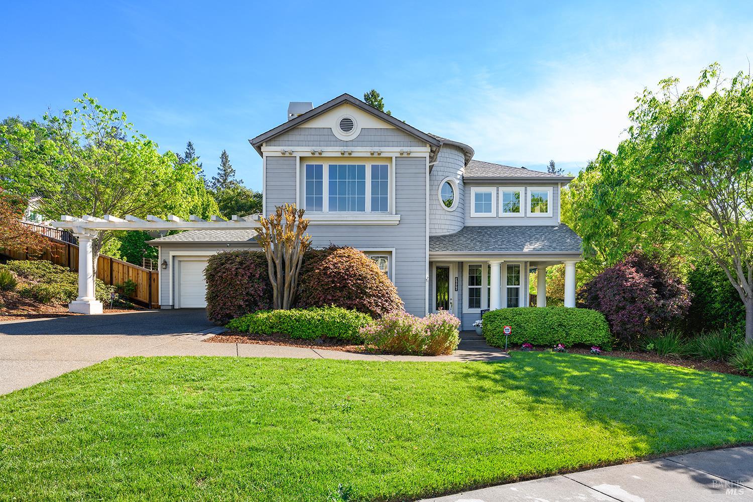 3696 Newbury Court Santa Rosa, CA 95404 - Photo 76 of 79 a front view of a house with a yard and potted plants