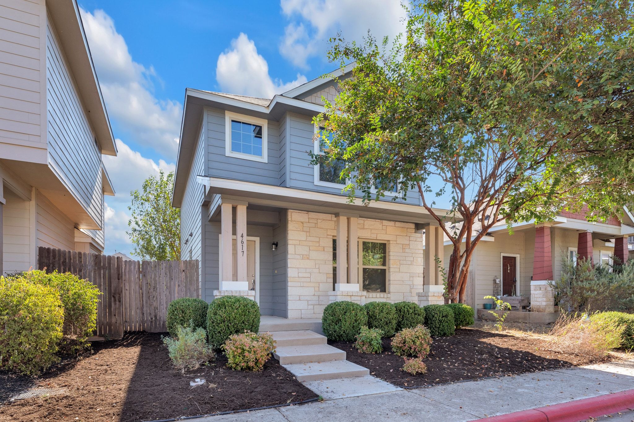 4617 Inicio Lane Austin, TX 78725 - Photo 1 of 1 View of front of property featuring a porch and stone siding