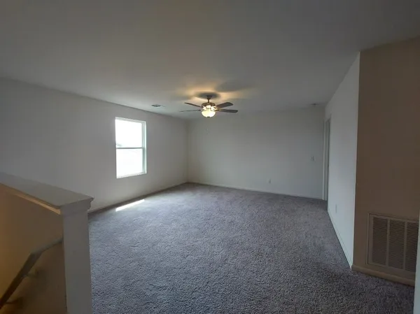 a view of a livingroom with a window