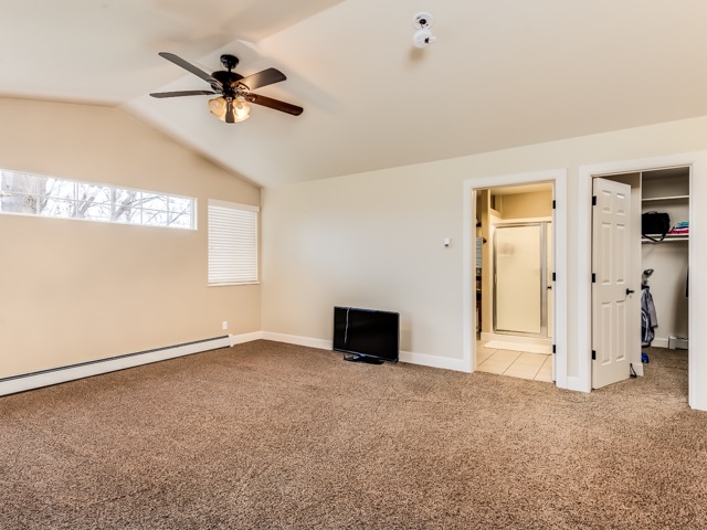 1677 L Road Fruita, CO 81521 - Photo 23 of 42 a view of a livingroom with a ceiling fan and window