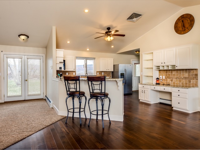 1677 L Road Fruita, CO 81521 - Photo 5 of 42 a view of a dining room with furniture window and wooden floor