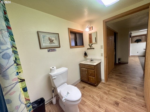 43174 Cupper Creek Road Kimberly, OR 97848 - Photo 16 of 48 a bathroom with a granite countertop toilet sink and mirror