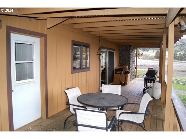 43174 Cupper Creek Road Kimberly, OR 97848 - Photo 23 of 48 a view of a dining room with furniture and wooden floor