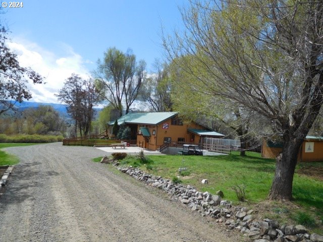 43174 Cupper Creek Road Kimberly, OR 97848 - Photo 27 of 48 a view of a house with a yard