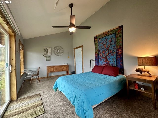 43174 Cupper Creek Road Kimberly, OR 97848 - Photo 33 of 48 a bedroom with a bed and a chandelier