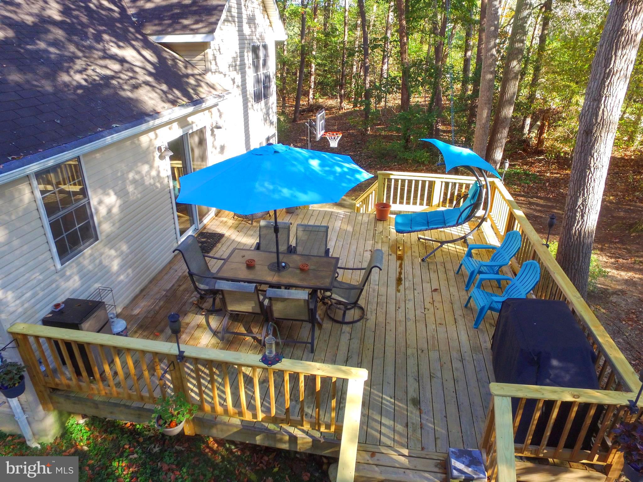 11144 Rawhide Road Lusby, MD 20657 - Photo 2 of 33 Entertainment geared back deck