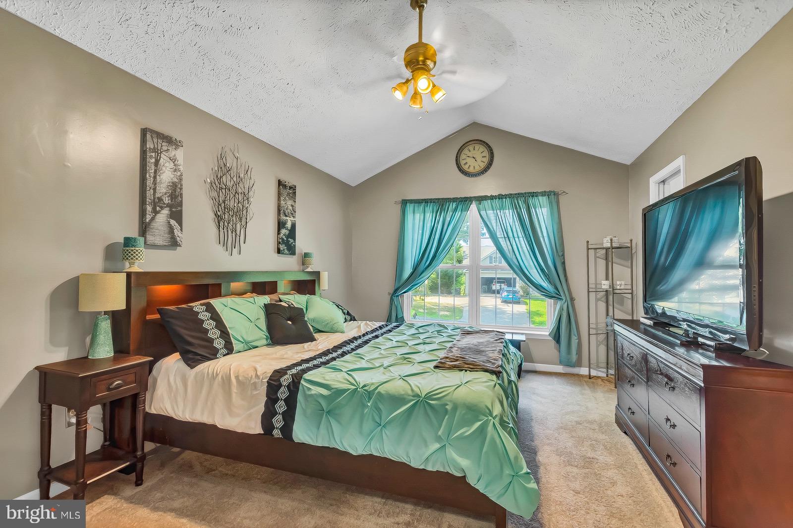 11144 Rawhide Road Lusby, MD 20657 - Photo 14 of 33 Master suite with cathedral ceilings as wel