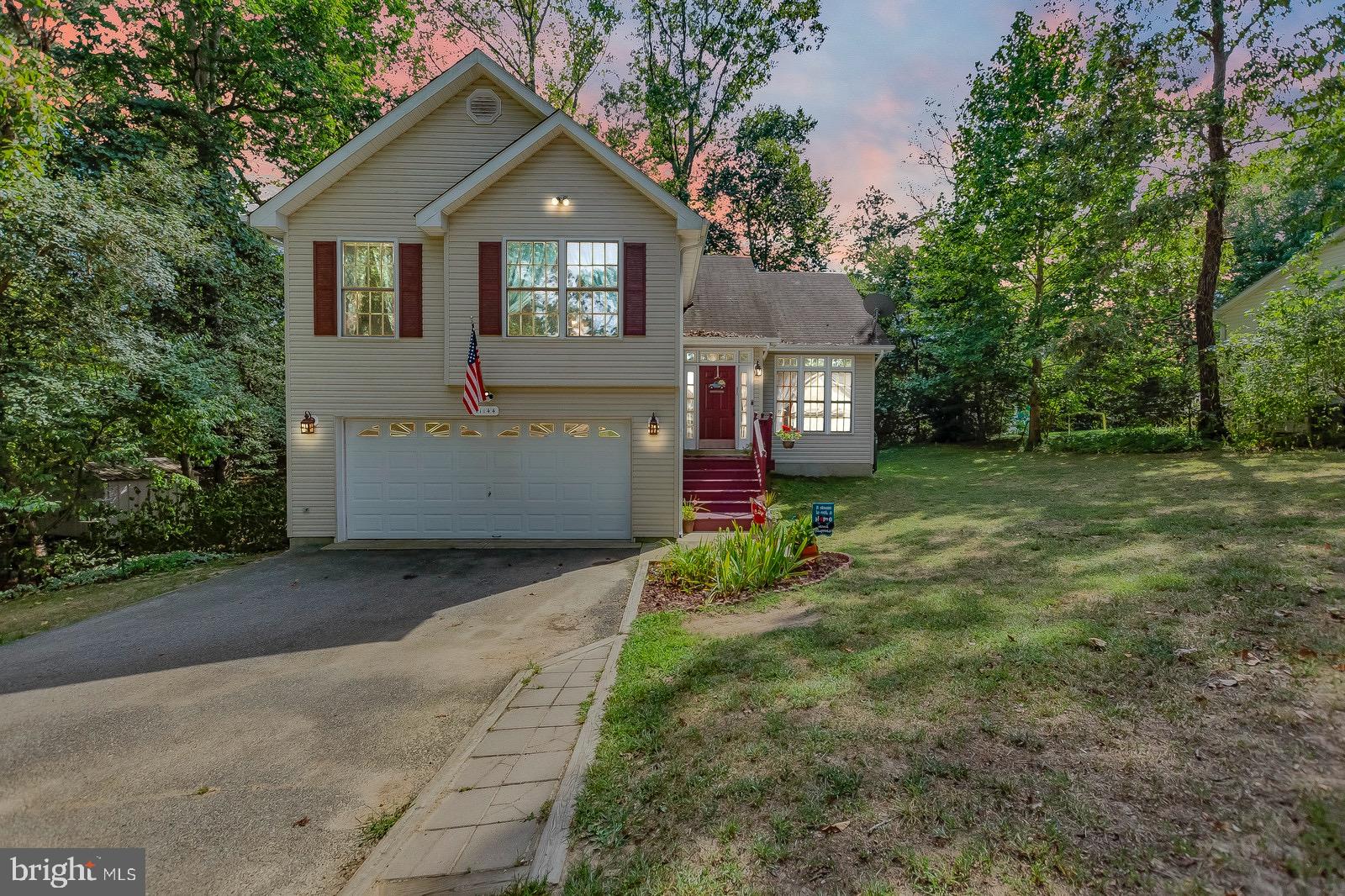 11144 Rawhide Road Lusby, MD 20657 - Photo 3 of 33 2 car garage plus a paved driveway