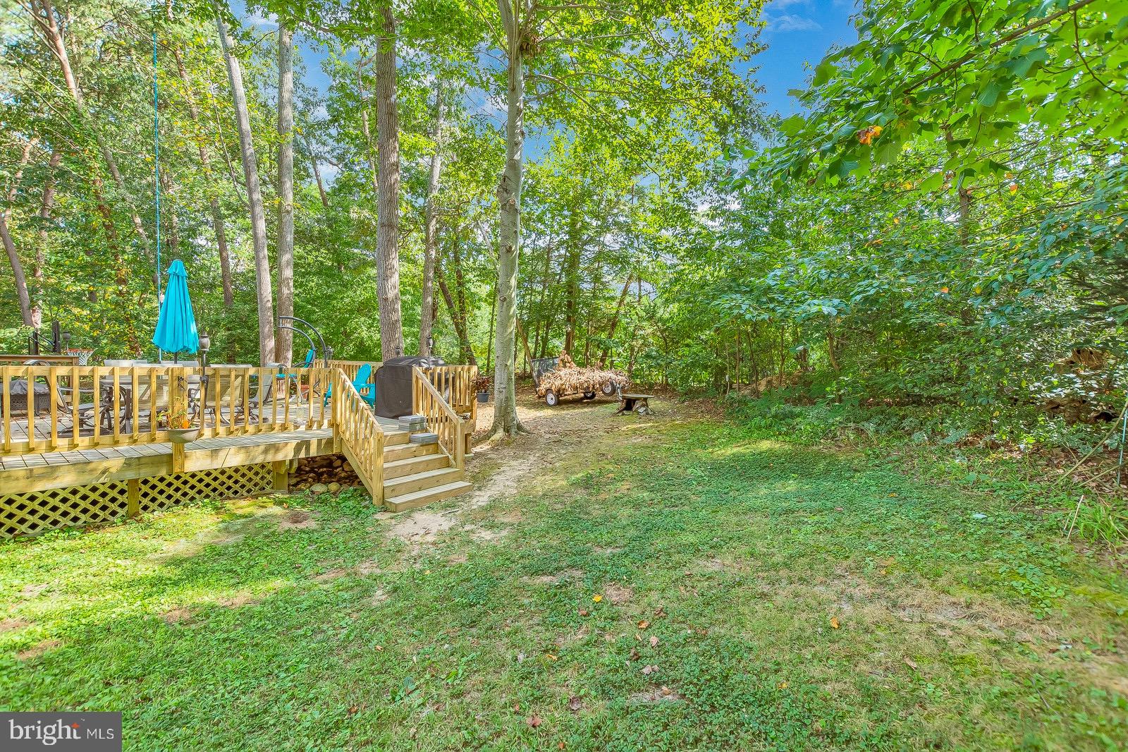 11144 Rawhide Road Lusby, MD 20657 - Photo 26 of 33 Huge back deck for parties and grilling