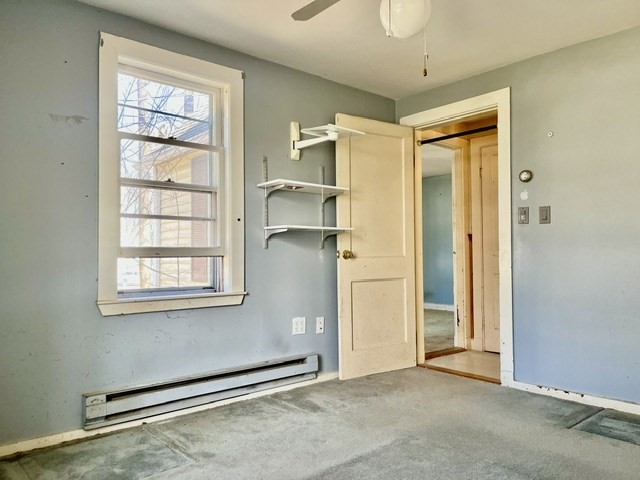 36 Summit Street Framingham, MA 01702 - Photo 11 of 24 an empty room with a empty space and windows