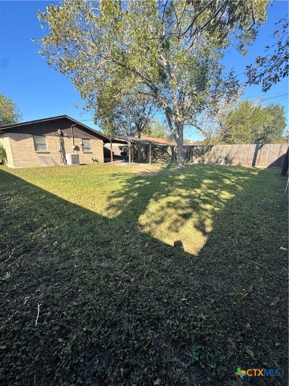 4602 Dahlia Lane Victoria, TX 77904 - Photo 16 of 16 a front view of a house with a yard