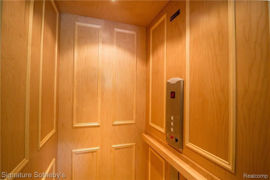 1400 Dockham Road Columbiaville, MI 48421 - Photo 46 of 73 Elevator Goes to All 3 Levels Of The House